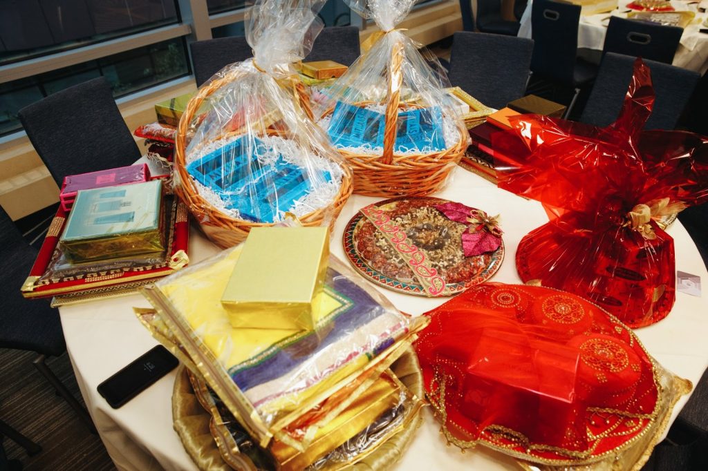 A table with wrapped gifts for an office Diwali celebration