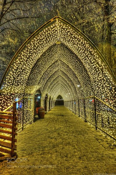 Couple Walk Through a Light Tunnel