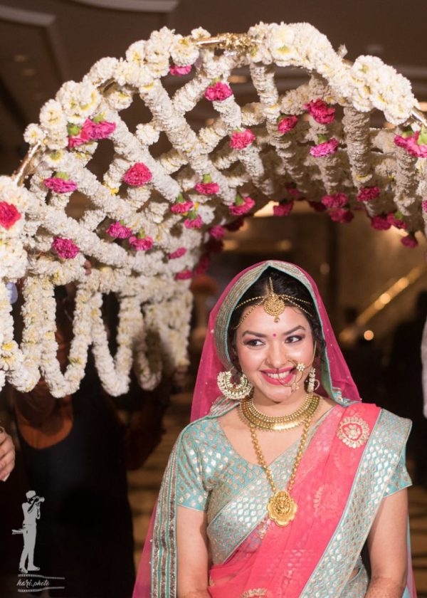 Enter Under a Dome-Shaped Floral Canopy